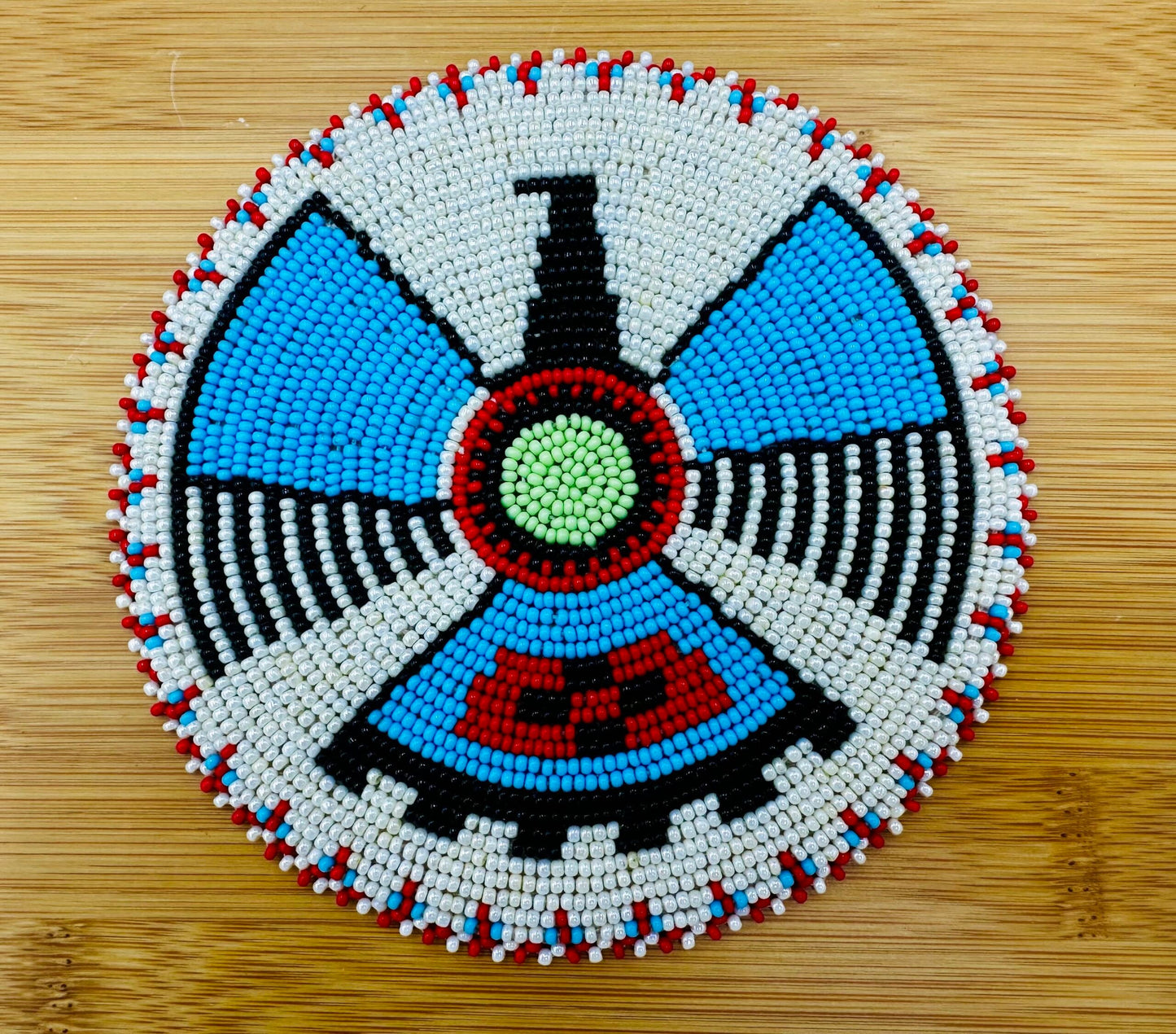 Handmade beaded Cream Thunderbird 5 inch rosette